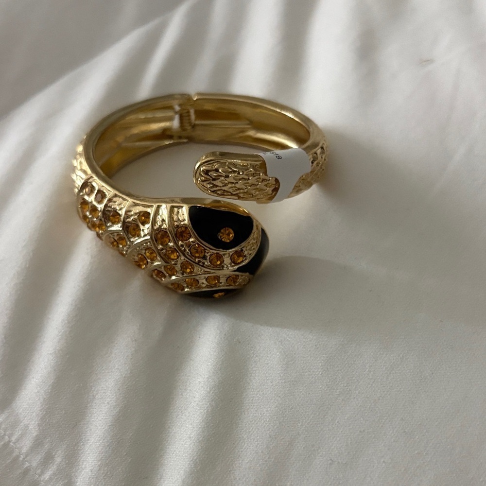 Elegant Gold and Black Snake Bracelet